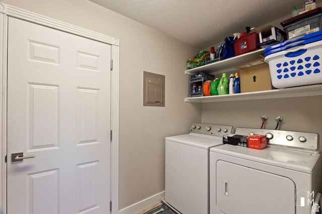 657 W 150 S, Hurricane, UT 84737 - clothes washing area with a textured ceiling, separate washer and dryer, laundry area, electric panel, and baseboards