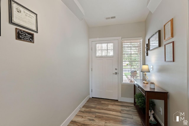 657 W 150 S, Hurricane, UT 84737 - doorway to outside with wood finished floors, visible vents, and baseboards