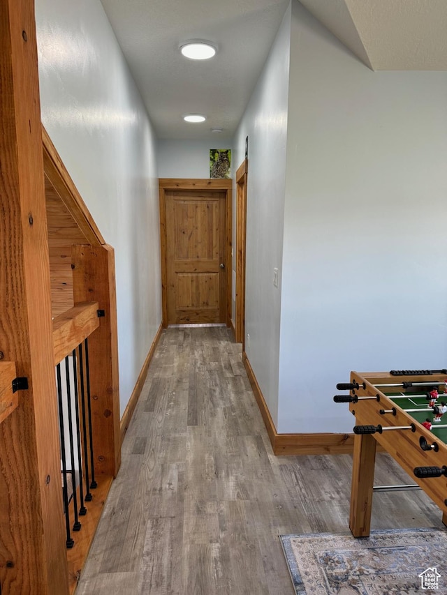 1595 S Bear Lake Blvd, Garden City, UT 84028 - hall featuring baseboards and wood finished floors