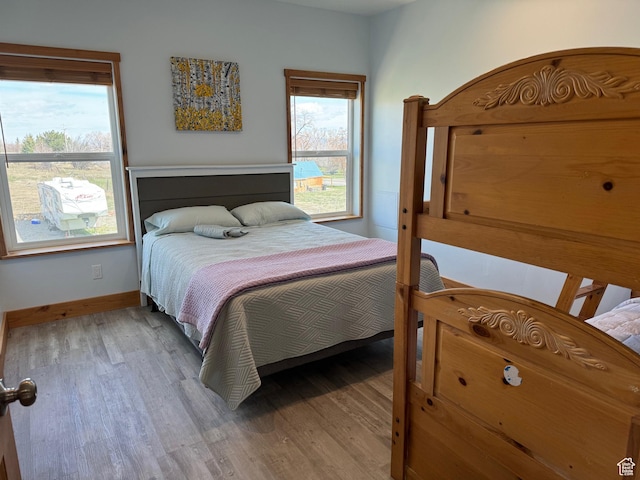 1595 S Bear Lake Blvd, Garden City, UT 84028 - bedroom featuring light wood-style floors and baseboards