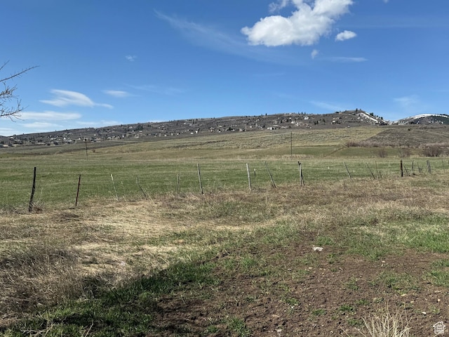 1595 S Bear Lake Blvd, Garden City, UT 84028 - view of yard featuring a rural view and fence