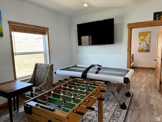 1595 S Bear Lake Blvd, Garden City, UT 84028 - rec room featuring recessed lighting, a textured ceiling, baseboards, and wood finished floors