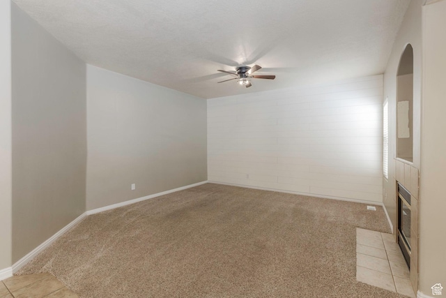 898 E Tendoy Ct S, Draper, UT 84020 - unfurnished room with light carpet, arched walkways, baseboards, and ceiling fan