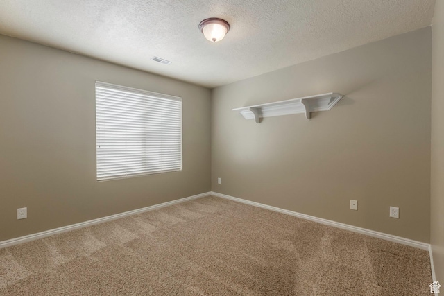 898 E Tendoy Ct S, Draper, UT 84020 - unfurnished room with a textured ceiling, baseboards, visible vents, and carpet floors