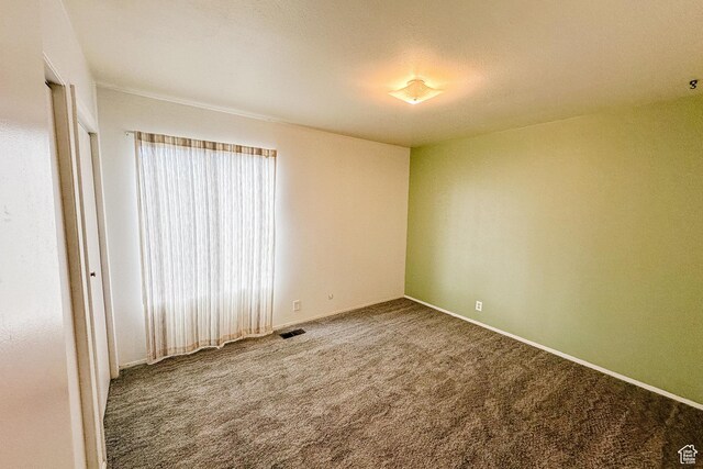 88 W 50 S Unit V-1, Centerville, UT 84014 - spare room featuring baseboards, visible vents, and carpet flooring