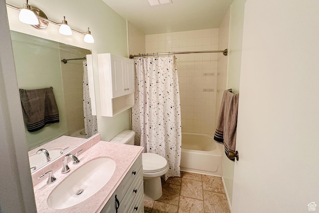 88 W 50 S Unit V-1, Centerville, UT 84014 - bathroom with visible vents, toilet, stone finish flooring, shower / bath combination with curtain, and vanity