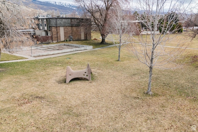 88 W 50 S Unit V-1, Centerville, UT 84014 - view of yard with a mountain view