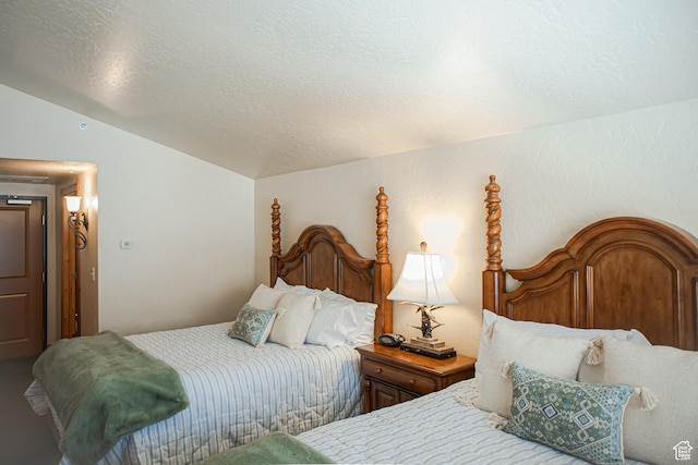 840 W Bigler Ln N Unit 3013, Midway, UT 84049 - bedroom featuring vaulted ceiling and a textured ceiling