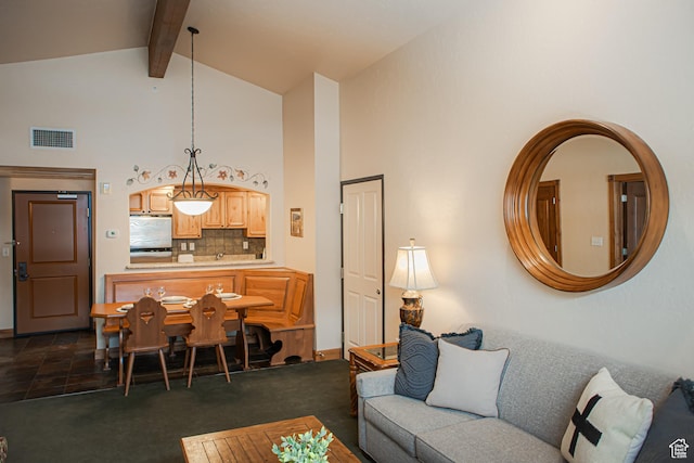 840 W Bigler Ln N Unit 3013, Midway, UT 84049 - living area with high vaulted ceiling, visible vents, dark carpet, and beam ceiling