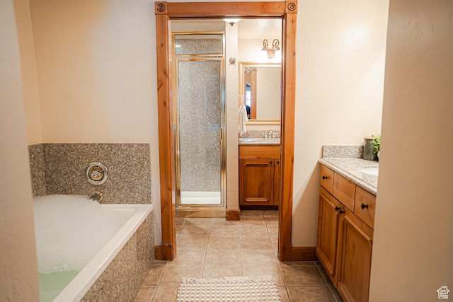 840 W Bigler Ln N Unit 3013, Midway, UT 84049 - bathroom featuring a garden tub, vanity, a shower stall, and tile patterned floors