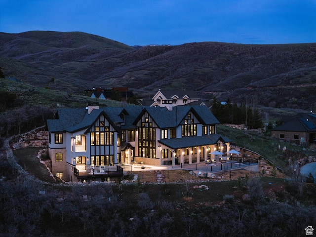 rear view of house with a mountain view
