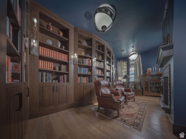 6153 E Last Monument Cir, Salt Lake City, UT 84108 - sitting room featuring wood finished floors