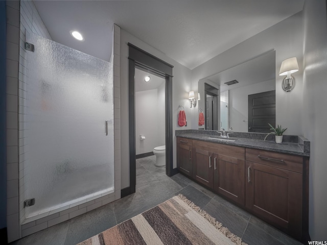 6153 E Last Monument Cir, Salt Lake City, UT 84108 - bathroom with tile patterned floors, toilet, vanity, baseboards, and a stall shower