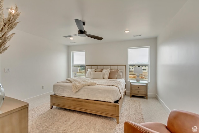 carpeted bedroom with recessed lighting, visible vents, baseboards, and ceiling fan