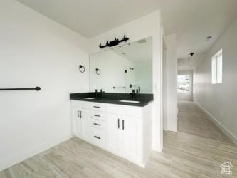 5644 W 7340 S, West Jordan, UT 84081 - bathroom featuring wood finished floors and double vanity
