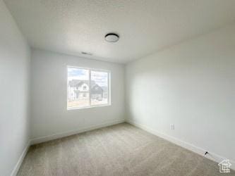 5644 W 7340 S, West Jordan, UT 84081 - carpeted empty room with baseboards