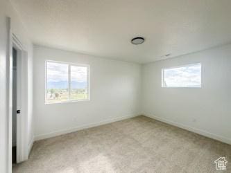 5644 W 7340 S, West Jordan, UT 84081 - unfurnished bedroom featuring light colored carpet and baseboards
