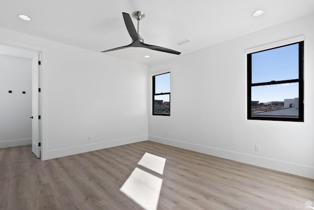 1461 W Canyon Tree Dr, St George, UT 84770 - empty room featuring recessed lighting, light wood-type flooring, a ceiling fan, and baseboards