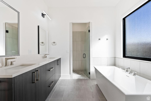 1461 W Canyon Tree Dr, St George, UT 84770 - full bathroom with a freestanding bath, double vanity, a stall shower, and a sink