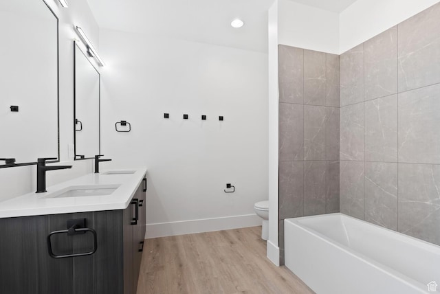 1461 W Canyon Tree Dr, St George, UT 84770 - full bathroom featuring double vanity, a sink, baseboards, and wood finished floors