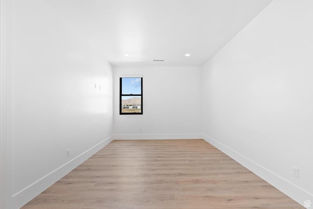 1461 W Canyon Tree Dr, St George, UT 84770 - empty room with light wood-style floors and baseboards