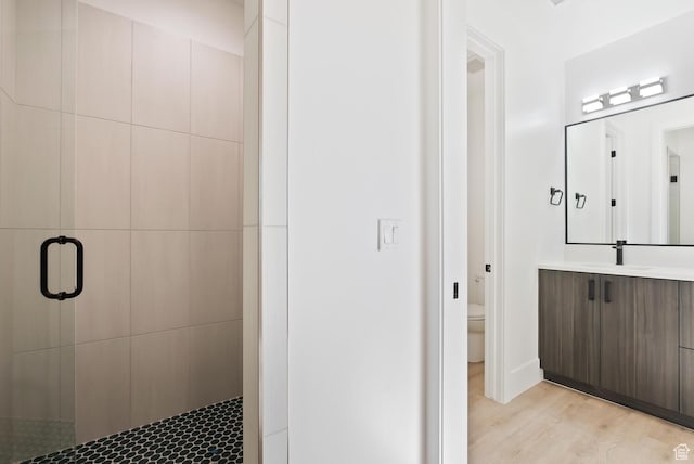 1461 W Canyon Tree Dr, St George, UT 84770 - full bath featuring toilet, a stall shower, wood finished floors, and vanity