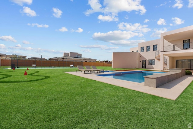 1461 W Canyon Tree Dr, St George, UT 84770 - view of swimming pool featuring a lawn, a patio area, fence, and a fenced in pool