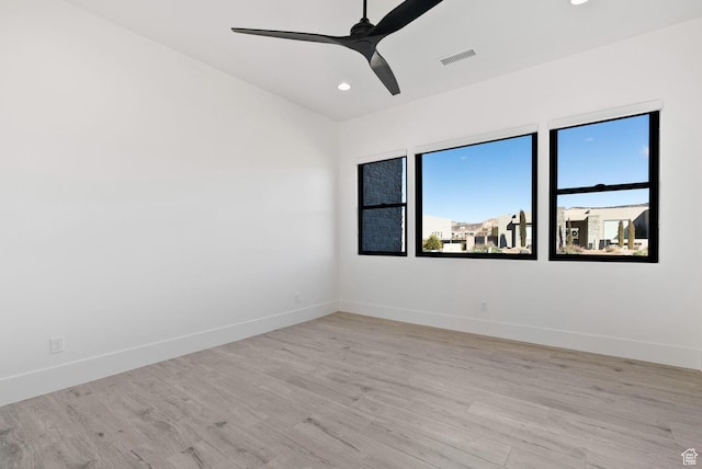 1461 W Canyon Tree Dr, St George, UT 84770 - empty room featuring light wood finished floors, ceiling fan, visible vents, and baseboards