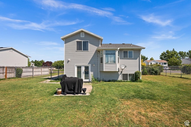 2337 W 2075 N, Clinton, UT 84015 - back of house with french doors and a fenced backyard