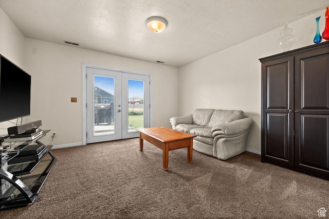 2337 W 2075 N, Clinton, UT 84015 - carpeted living room featuring french doors and a textured ceiling