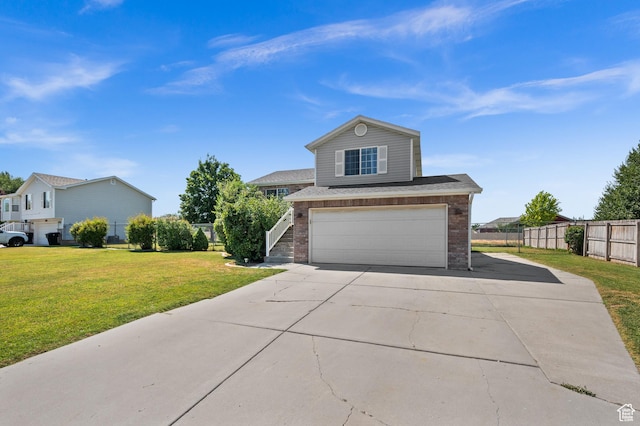 2337 W 2075 N, Clinton, UT 84015 - view of front facade featuring an attached garage, brick siding, driveway, and stairs