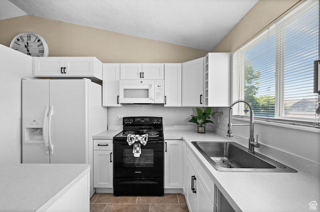 2337 W 2075 N, Clinton, UT 84015 - kitchen featuring white appliances, lofted ceiling, light countertops, white cabinets, and light tile patterned floors