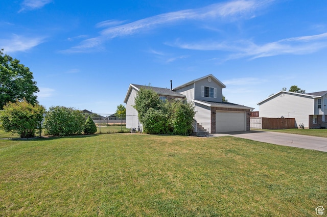 2337 W 2075 N, Clinton, UT 84015 - view of front of home featuring driveway and a garage