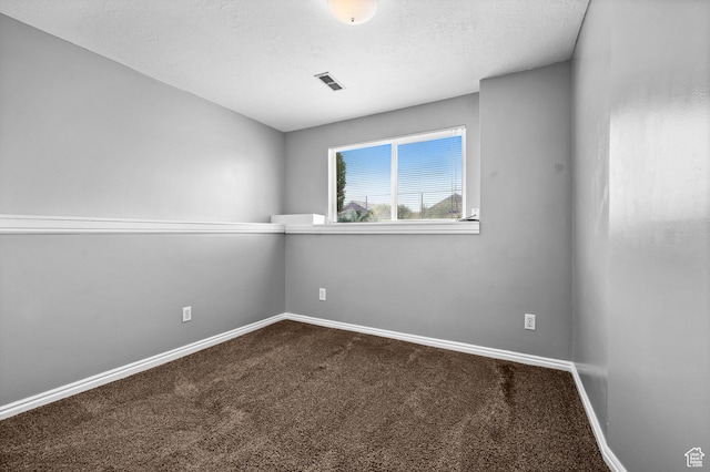 2337 W 2075 N, Clinton, UT 84015 - unfurnished room with dark carpet and a textured ceiling