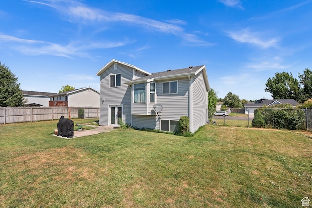 2337 W 2075 N, Clinton, UT 84015 - back of property with a fenced backyard, a patio, and french doors