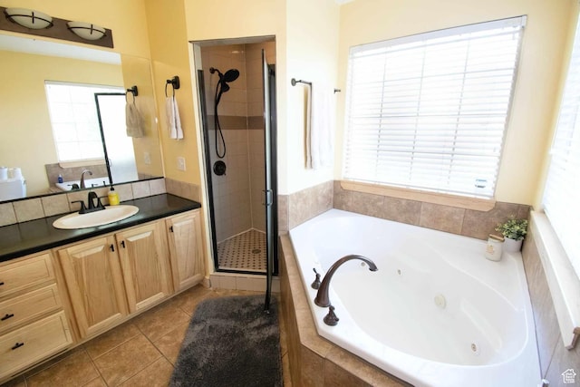 140 E 100 S, Centerfield, UT 84622 - full bathroom featuring a stall shower, vanity, a whirlpool tub, and tile patterned floors
