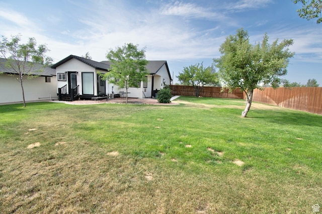 140 E 100 S, Centerfield, UT 84622 - view of yard featuring entry steps and a fenced backyard