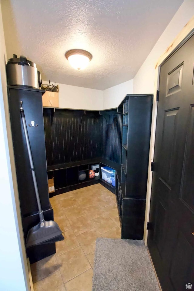 140 E 100 S, Centerfield, UT 84622 - interior space with light tile patterned floors and a textured ceiling