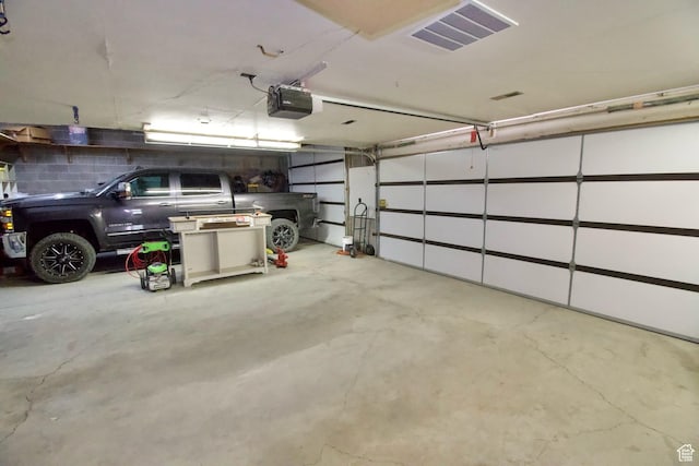 140 E 100 S, Centerfield, UT 84622 - parking deck featuring a garage door opener and visible vents