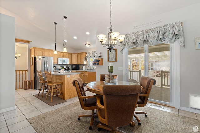 333 S Park St, Grantsville, UT 84029 - dining space with light tile patterned floors, visible vents, and an inviting chandelier