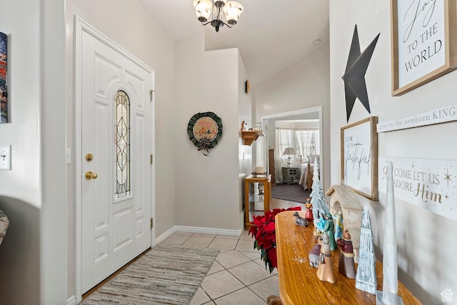 333 S Park St, Grantsville, UT 84029 - entrance foyer featuring light tile patterned floors, baseboards, and a notable chandelier