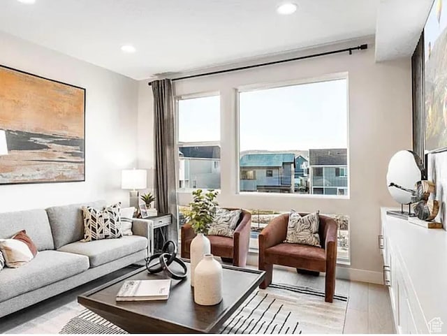 6785 Silver Creek Dr N, Park City, UT 84098 - living area with light wood finished floors, recessed lighting, and baseboards