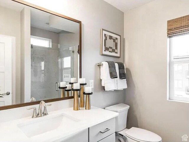 6785 Silver Creek Dr N, Park City, UT 84098 - full bathroom with a stall shower, toilet, and vanity