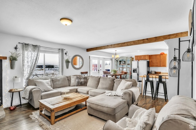33841 N 7925 E, Fairview, UT 84629 - living area featuring dark wood-style floors, a chandelier, beamed ceiling, and baseboards