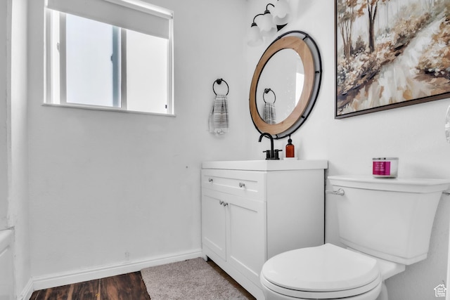 33841 N 7925 E, Fairview, UT 84629 - bathroom with baseboards, vanity, toilet, and wood finished floors