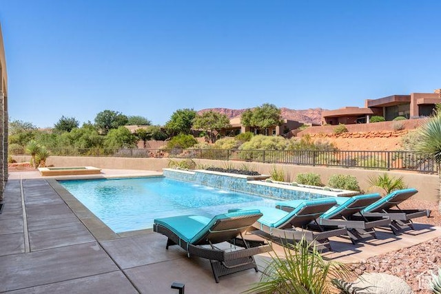 3052 N Snow Canyon Pkwy Unit 201, St George, UT 84770 - view of pool with a fenced in pool, a fenced backyard, a patio, and a mountain view