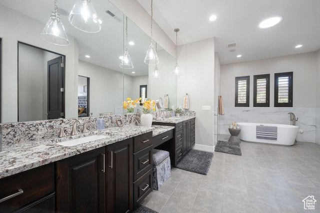 3052 N Snow Canyon Pkwy Unit 201, St George, UT 84770 - full bath with visible vents, a soaking tub, tile patterned floors, vanity, and recessed lighting