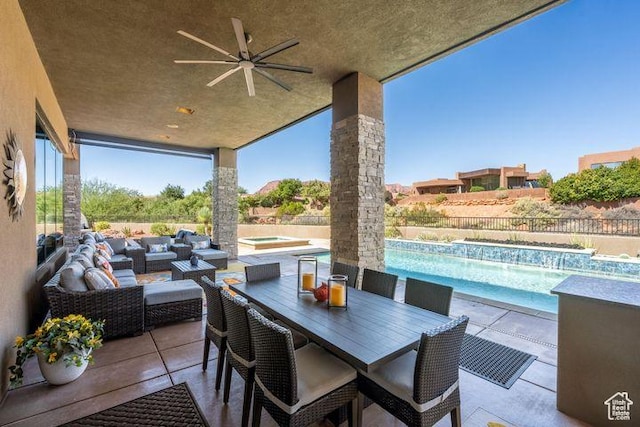 3052 N Snow Canyon Pkwy Unit 201, St George, UT 84770 - view of patio featuring a fenced in pool, outdoor lounge area, fence, ceiling fan, and an in ground hot tub