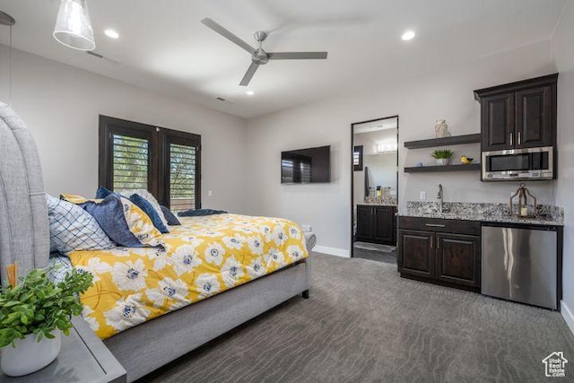 3052 N Snow Canyon Pkwy Unit 201, St George, UT 84770 - bedroom with dark colored carpet, recessed lighting, indoor wet bar, and baseboards