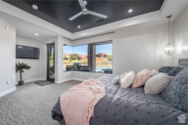 3052 N Snow Canyon Pkwy Unit 201, St George, UT 84770 - bedroom with visible vents, baseboards, a tray ceiling, carpet floors, and recessed lighting